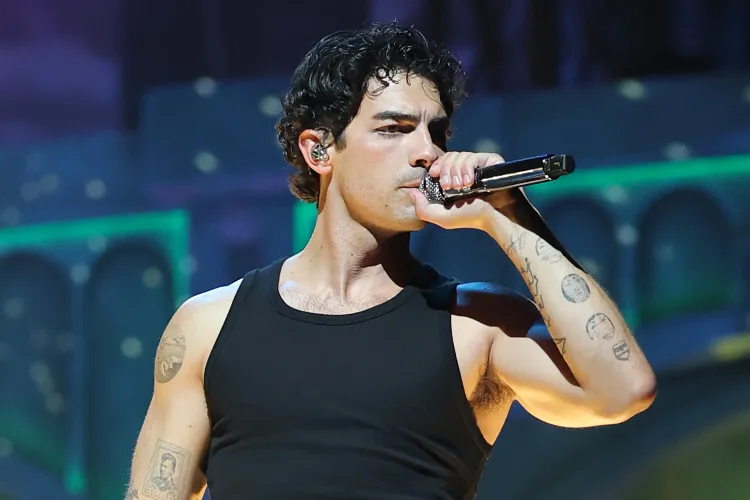 Joe Jonas Confirms He’s Reading Fan Signs at Concerts — and He’s ‘Easily Distracted’ By the PG-13 Ones